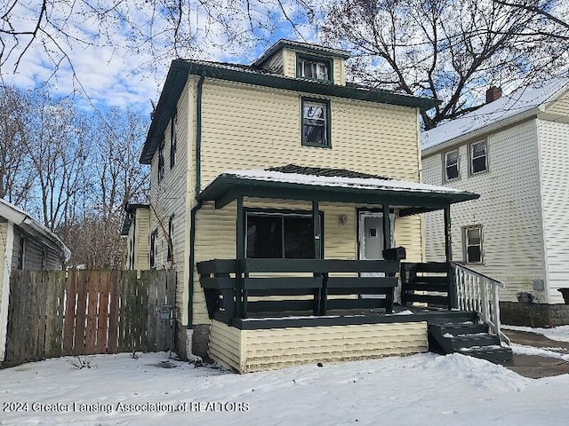 front facade featuring covered porch