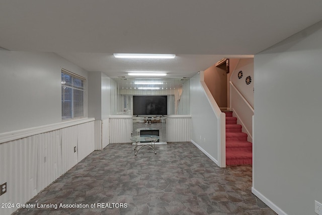 basement with a fireplace