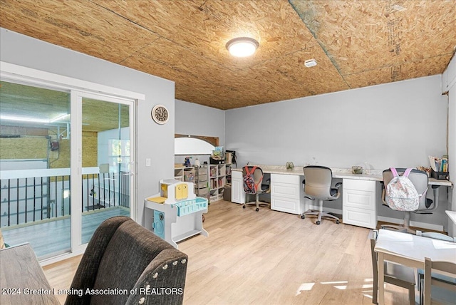 office with wooden ceiling and light hardwood / wood-style flooring