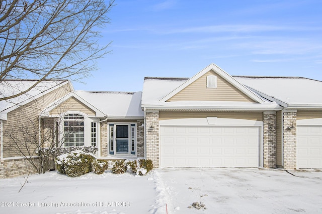 single story home with a garage