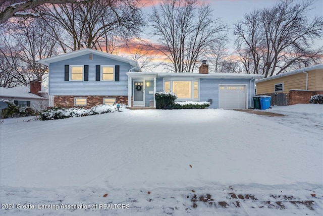 tri-level home featuring a garage