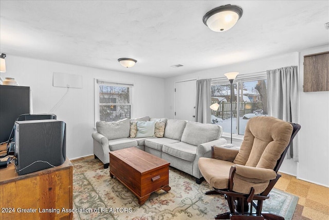 living room with plenty of natural light