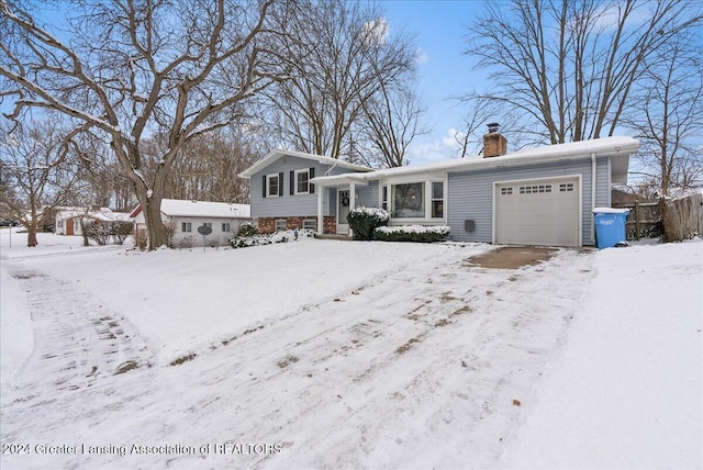 tri-level home featuring a garage