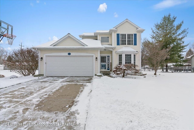 front facade with a garage