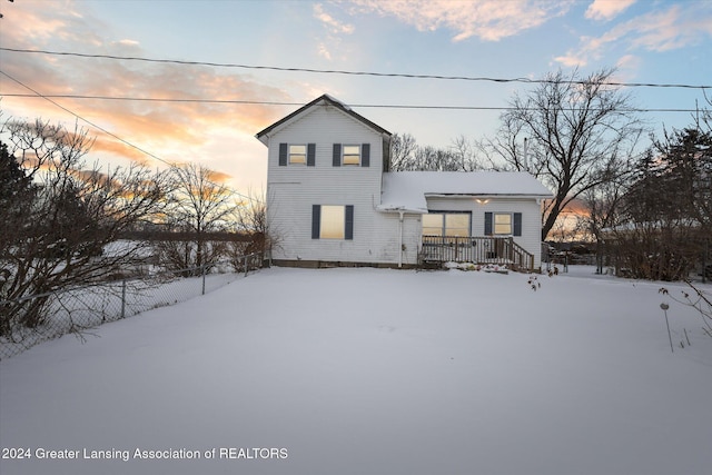 view of snow covered property