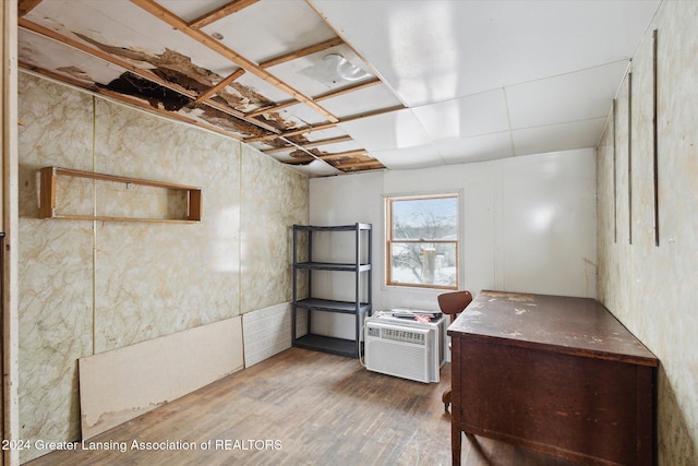 basement with hardwood / wood-style floors