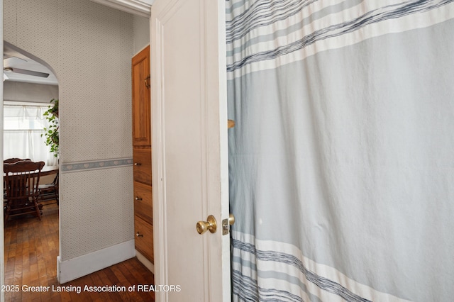 bathroom with hardwood / wood-style flooring