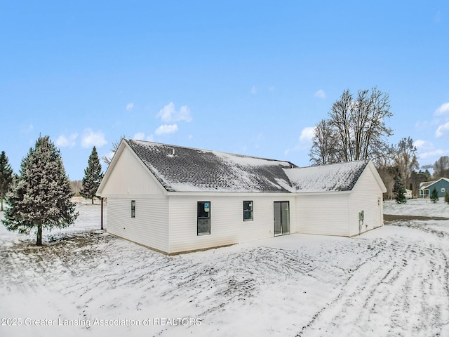 view of snow covered property