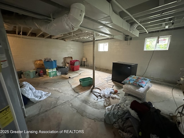 basement featuring refrigerator