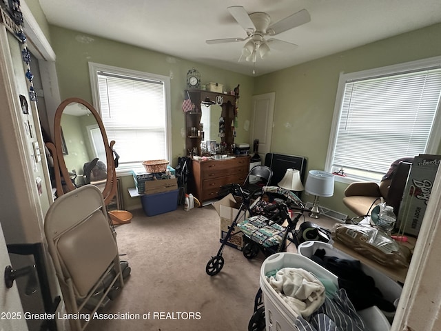 misc room featuring carpet floors and ceiling fan