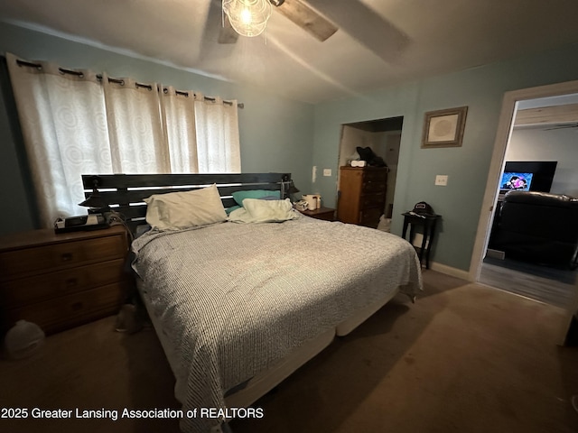 bedroom with ceiling fan and carpet flooring