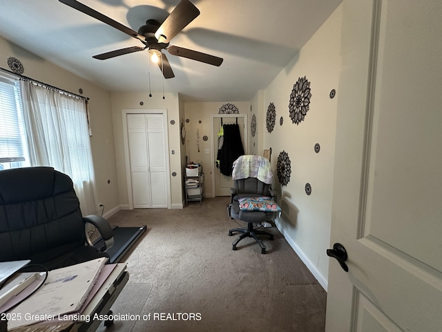 office space featuring ceiling fan and carpet flooring