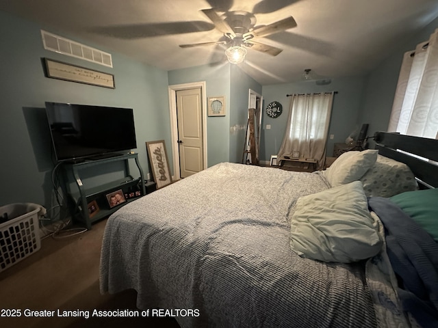 carpeted bedroom with ceiling fan