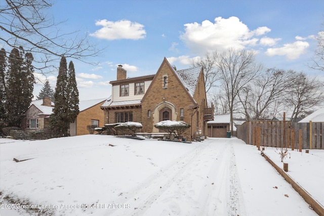 tudor house with a garage