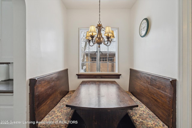 dining room featuring a chandelier