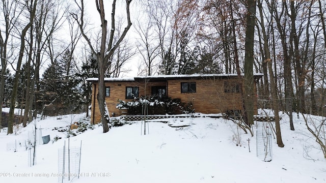 view of snow covered property