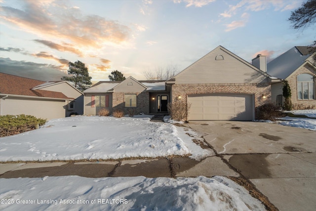 view of front of property featuring a garage