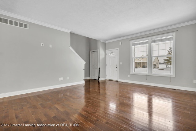 unfurnished living room with dark wood-type flooring and ornamental molding