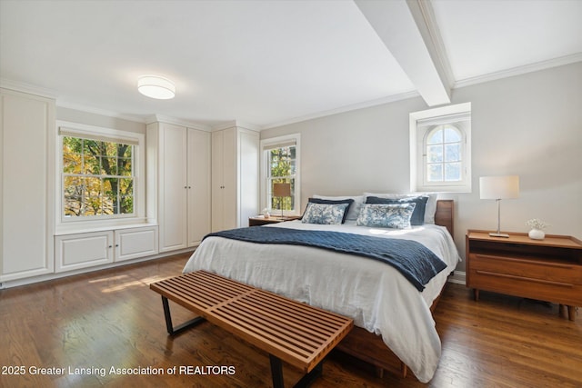 bedroom with crown molding, wood finished floors, and beamed ceiling