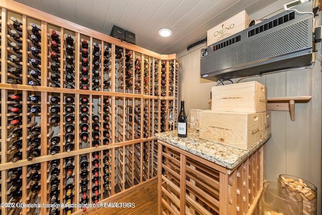 wine room with wooden ceiling and recessed lighting