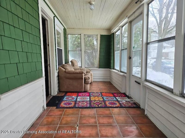 sunroom with wooden ceiling