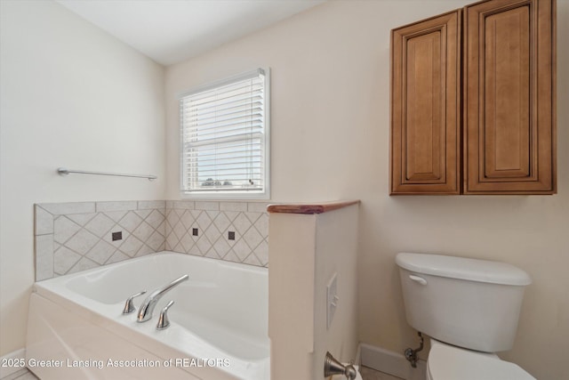 bathroom with toilet and a bathing tub