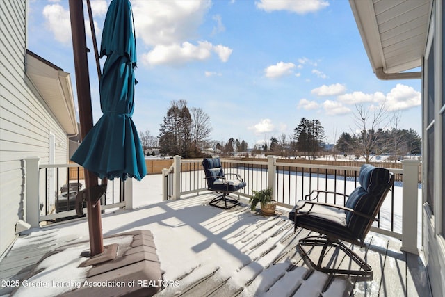 view of snow covered deck