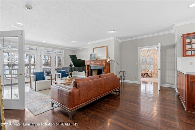 living room with french doors, dark hardwood / wood-style floors, and crown molding