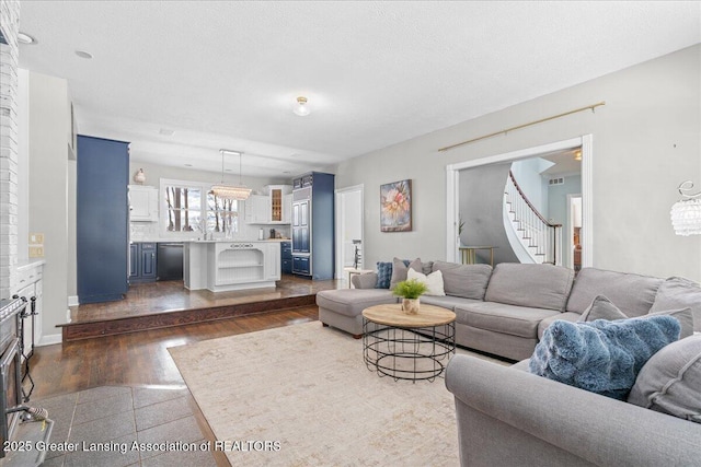 living room featuring a textured ceiling