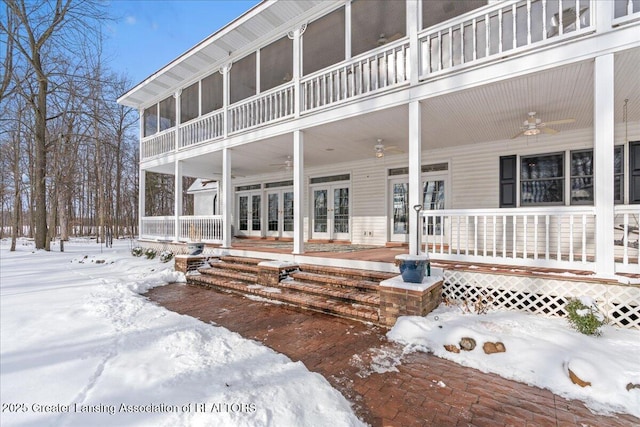 exterior space with french doors and ceiling fan