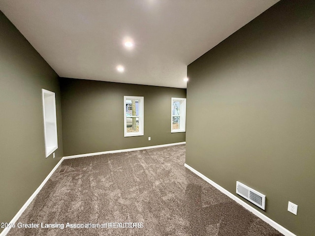 view of carpeted spare room