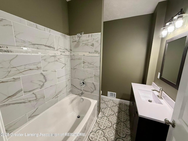 bathroom with tile patterned flooring and vanity