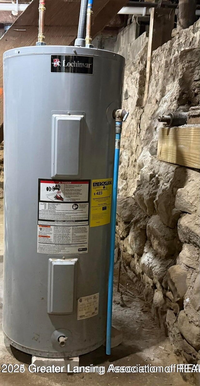 utility room featuring electric water heater