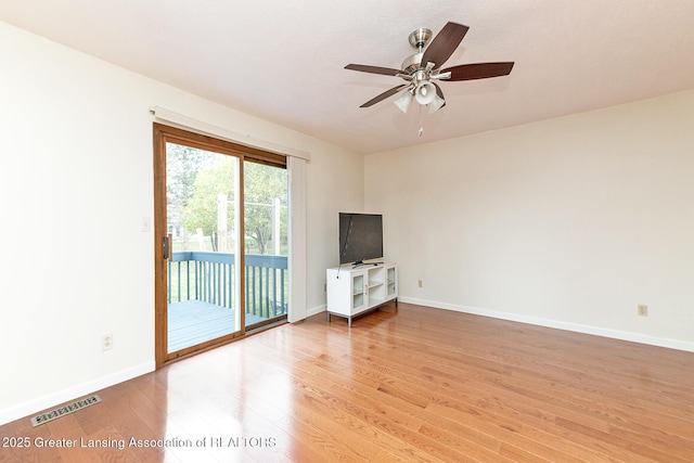 unfurnished living room with ceiling fan and light wood-type flooring