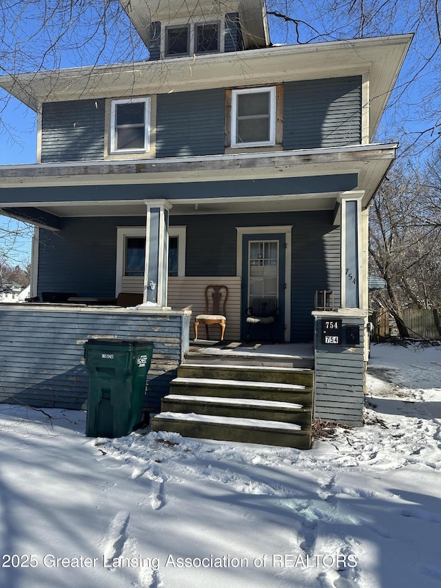 view of property featuring a porch