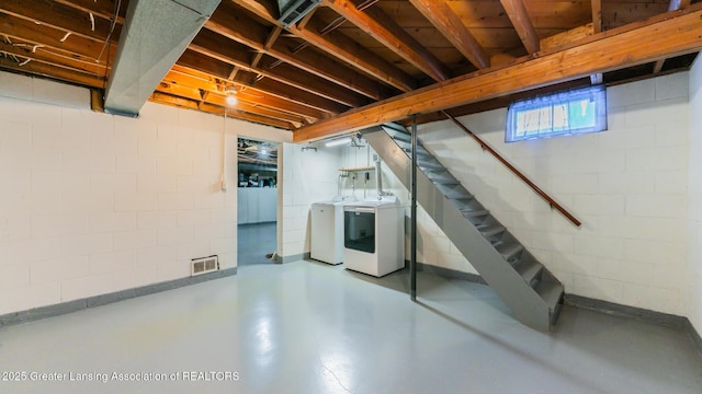 basement with separate washer and dryer