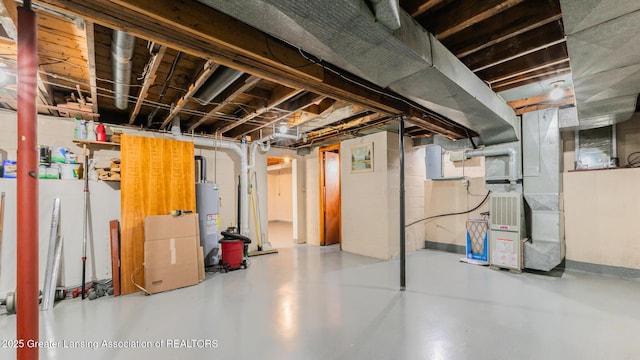 basement with heating unit and water heater