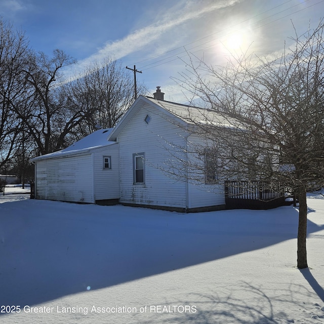 view of snow covered property