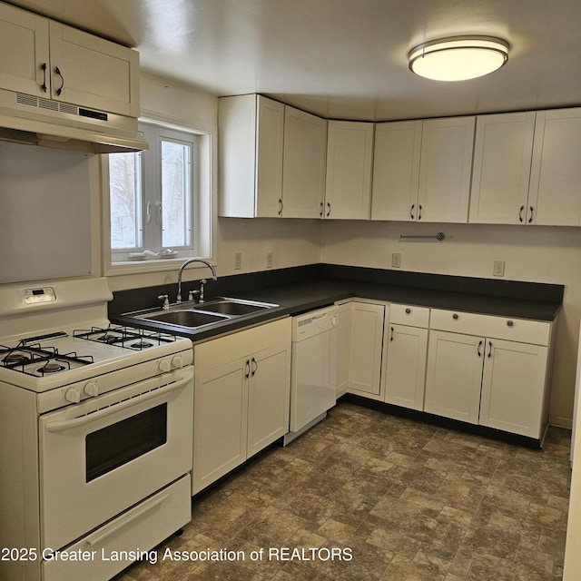 kitchen with white cabinetry, white appliances, and sink