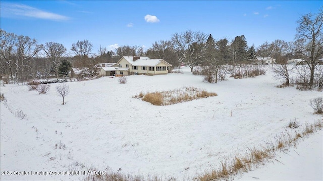 view of snowy yard