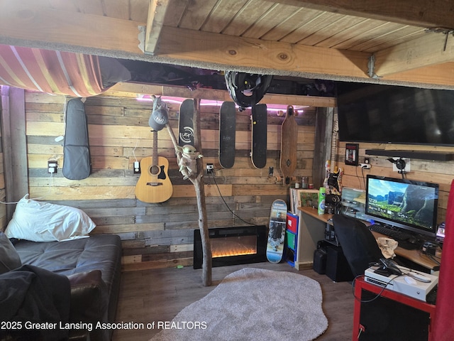 interior space with hardwood / wood-style flooring, wooden ceiling, and wood walls