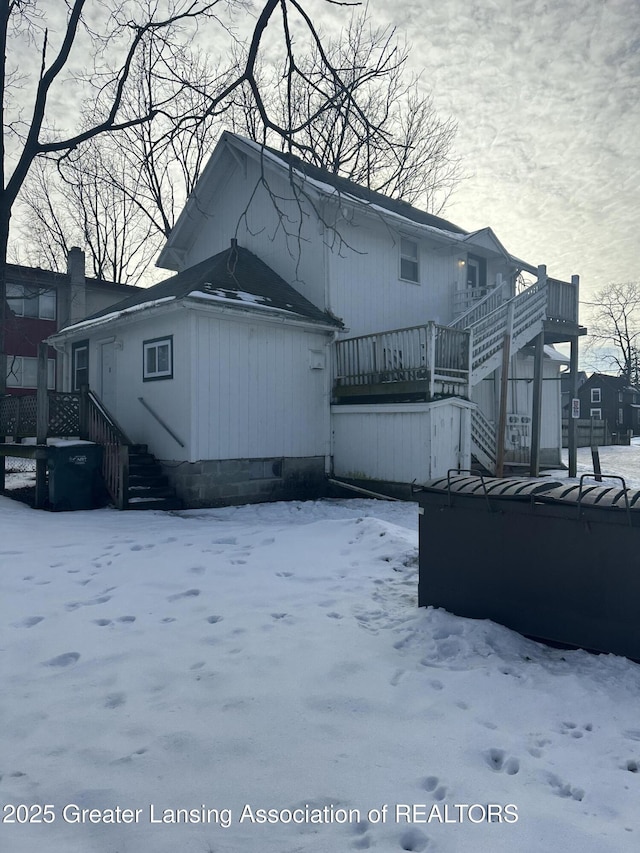 view of snow covered property