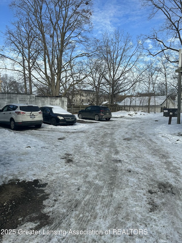 view of yard layered in snow