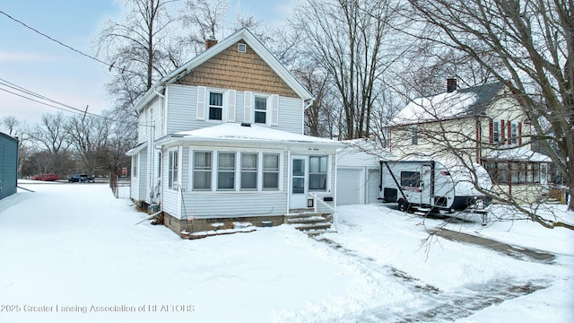 view of front of property with a garage