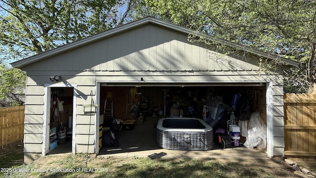 302 E Monroe St, Jackson, MI 49202 - detached garage featuring fence