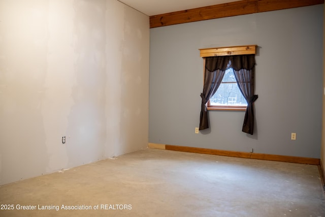 empty room featuring concrete flooring