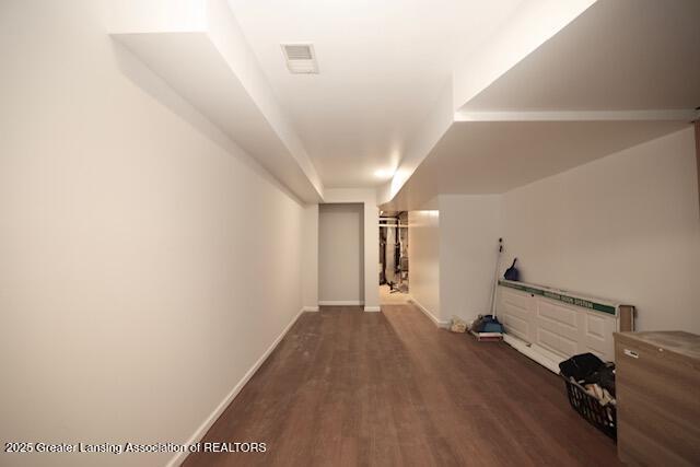 hall featuring dark hardwood / wood-style floors