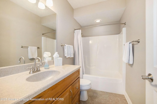 full bathroom with vanity, tile patterned floors, toilet, and shower / bath combo with shower curtain