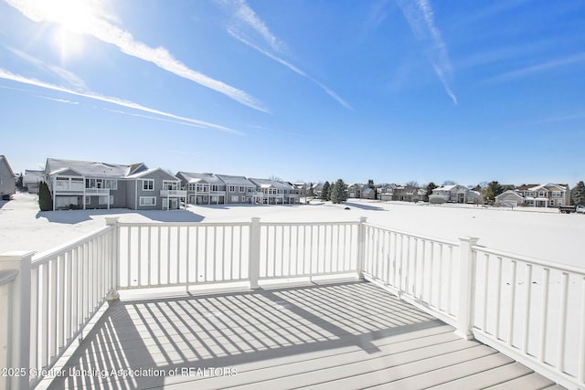 view of snow covered deck