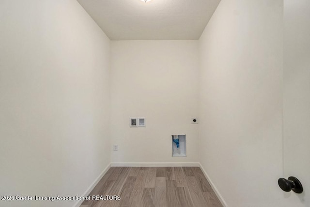 laundry room with baseboards, laundry area, light wood-style flooring, hookup for a washing machine, and hookup for an electric dryer